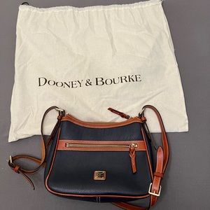 Dooney & Bourke - navy and tan trimmed should bag with dust bag